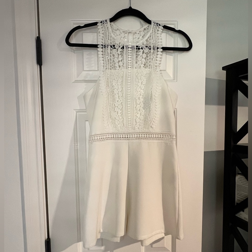Beautiful white romper with lace